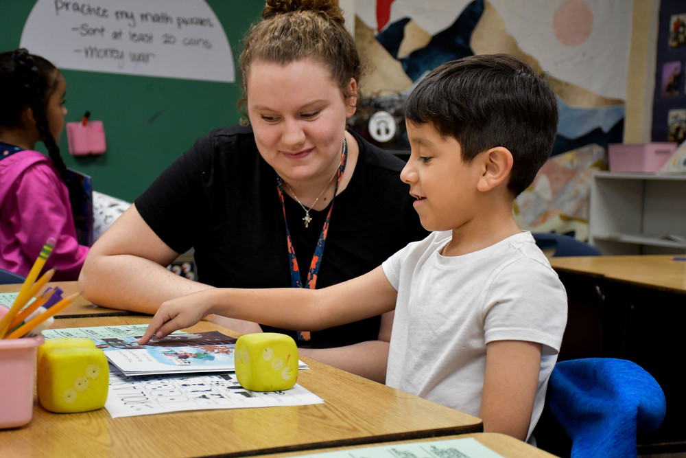 A Navarro Elementary Teacher Reads with a Student